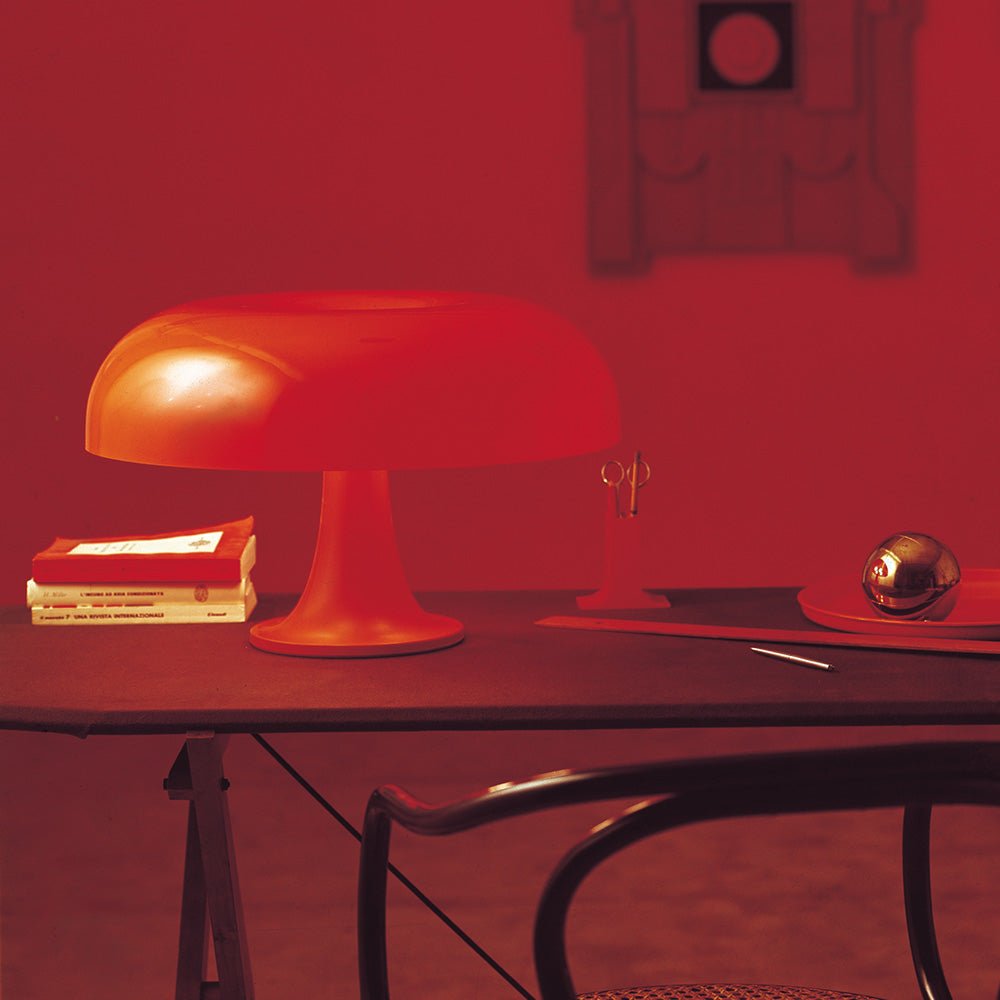 Lampe de table Nesso - Orange by Artemide | Luminaires & cie